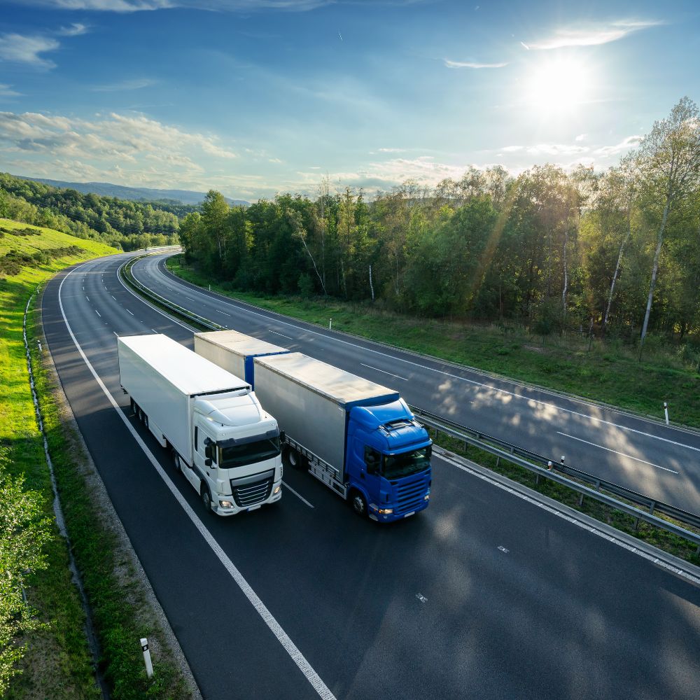 Truck transporting containers - In Land Transport Services